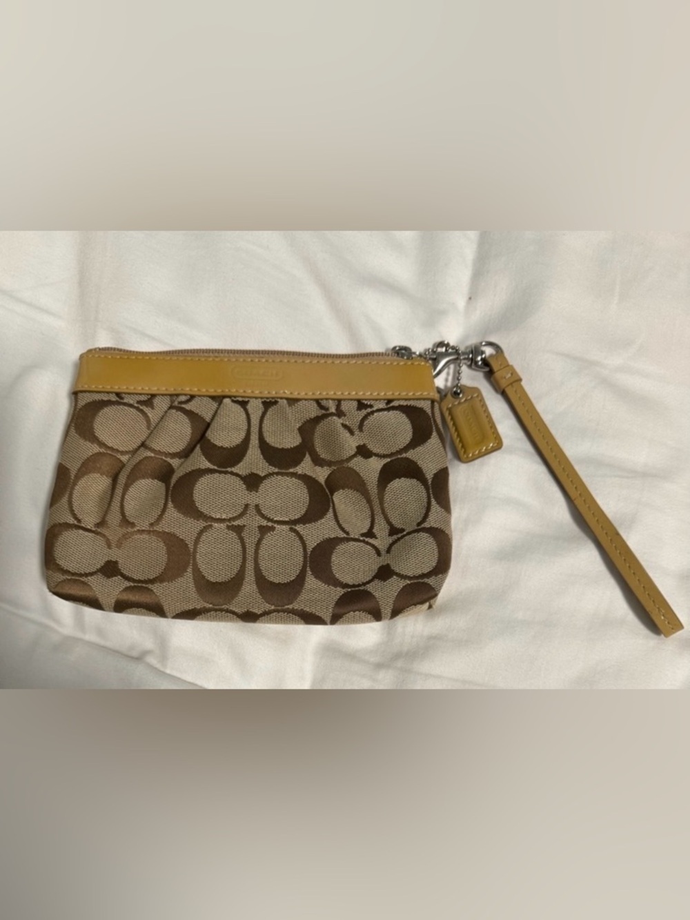 Coach Tan and Cream Signature Monogram gathered Wristlet with Hangtag!! Like New